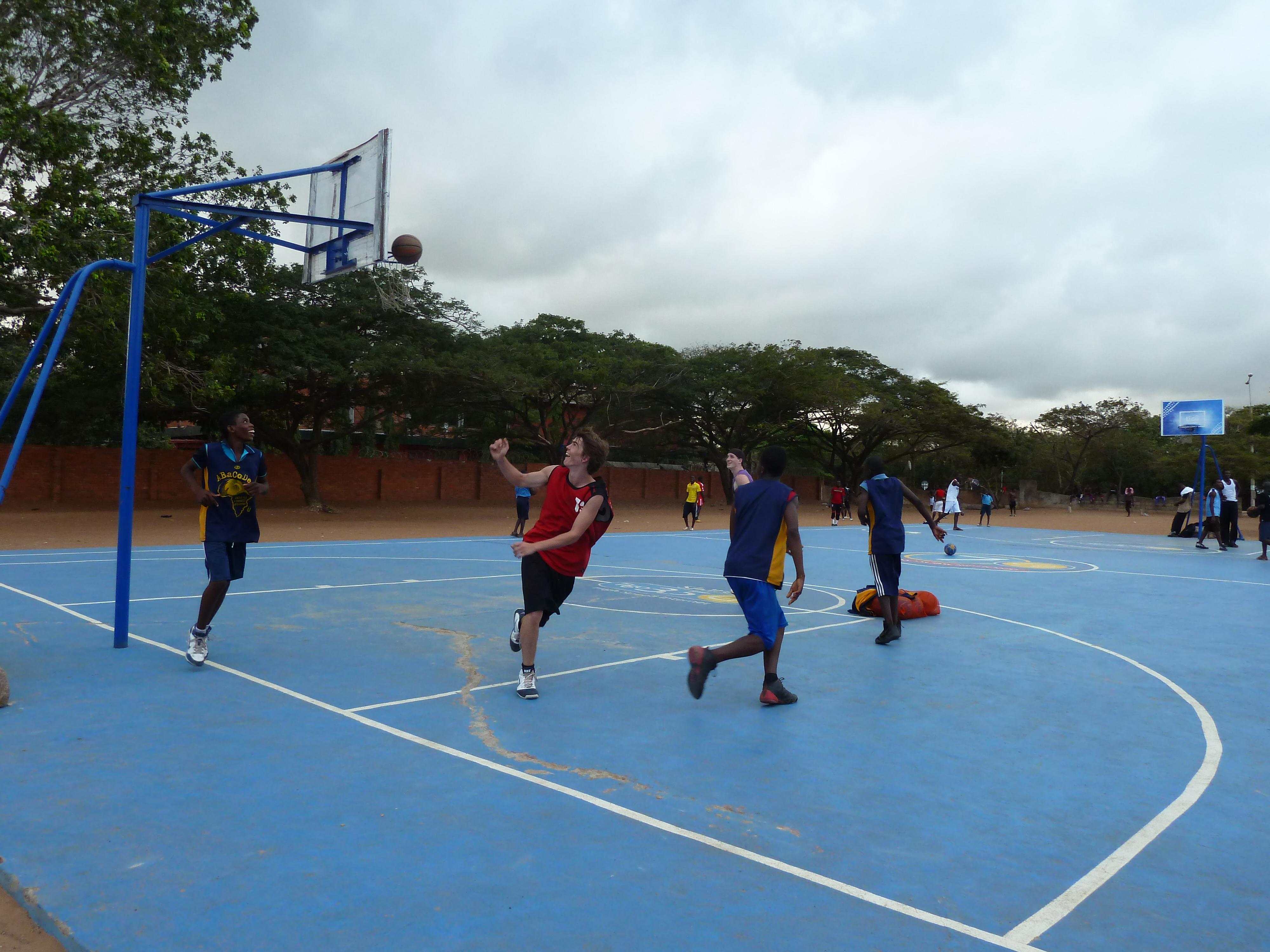 A sports instructor volunteers as a basketball coach in Ghana A Projects Abroad volunteer coaching basketball in Ghana
